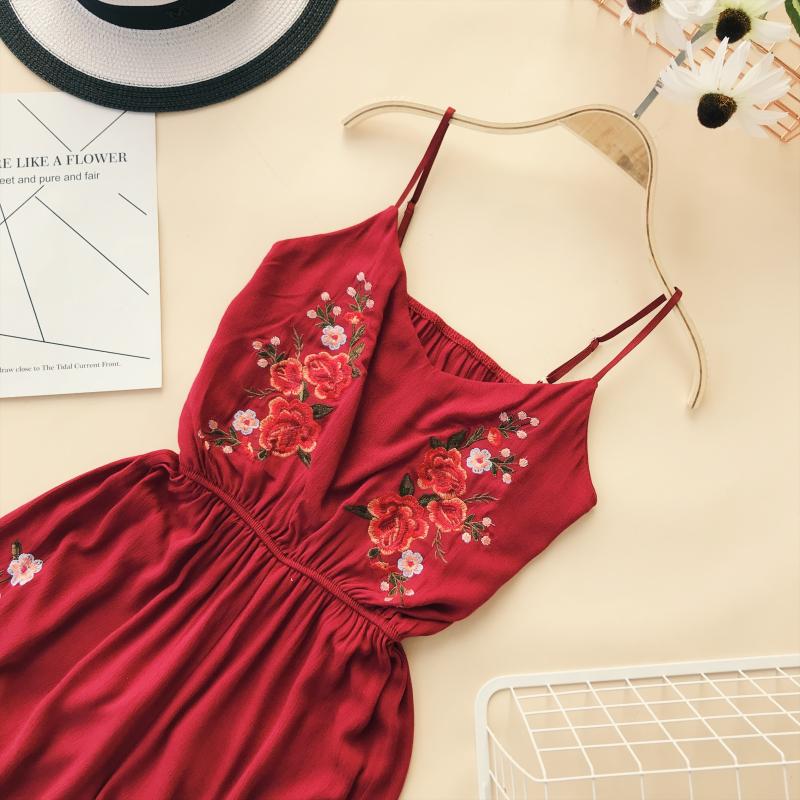 Kỳ nghỉ bên bờ biển gió quốc gia công việc nặng nề thêu hoa sling eo cao chân rộng quần short jumpsuit bãi biển quần short nữ thời trang