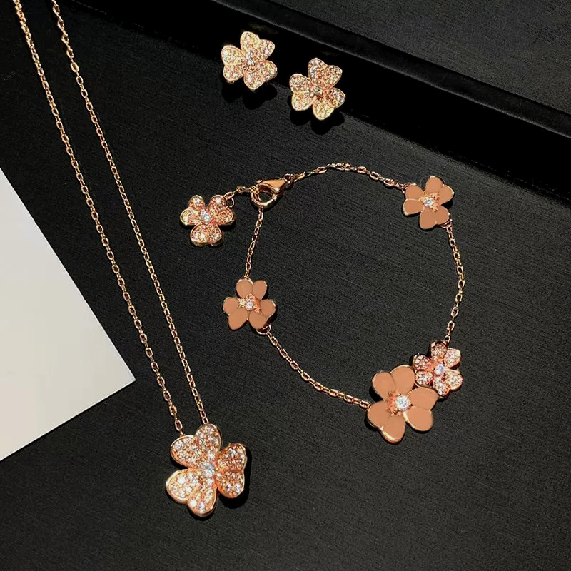Rose Gold Clover Necklace for Women, Simple Micro-Inlaid Zircon Earrings, Three-Dimensional Flower Niche High-End Bracelet Earrings Rose Gold Clover Necklace for Women, Simple Micro-Inlaid Zircon Earrings, Three-Dimensional Flower Niche High-End Bracelet Earrings