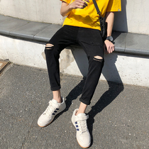 Net red White trembles with the same slim body one word knee hole casual pants Hong Kong wind students nine denim pants men