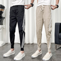 Youth slim sweatpants mens Korean version of slim stretch feet Haren pants trend three bars small feet Leisure
