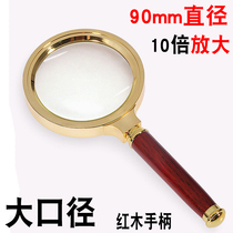 Old man reading magnifying glass holding 10 times high definition large diameter 90mm glass lens children explore spotlight ignition