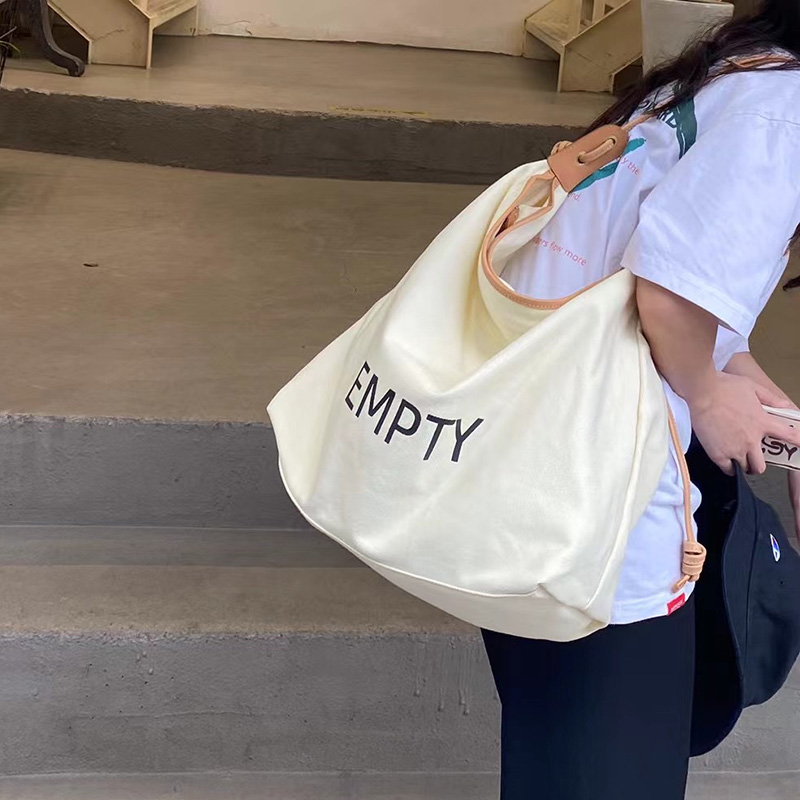 Canvas tote bag large-capacity Japanese one-shoulder messenger bag 2021 new all-match casual commuter bag tote bag