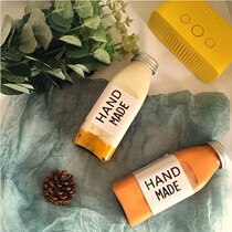 Sydney sea coconut cream glass bottle packaging Commercial milk tea cup Beverage bottle Sealed glass juice bottle with lid