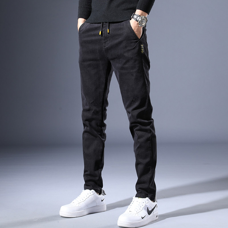 Hong Kong jeans men's 2022 spring and autumn new slim small feet tide brand high-end casual all-match long pants men