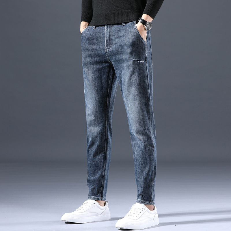 Hong Kong trendy brand high-end jeans men's autumn new slim feet straight tube Korean version trendy all-match long pants