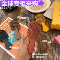 Japans WG Cupid comb mini net red blowing shape anti-static massage dry and wet dual-use portable portable