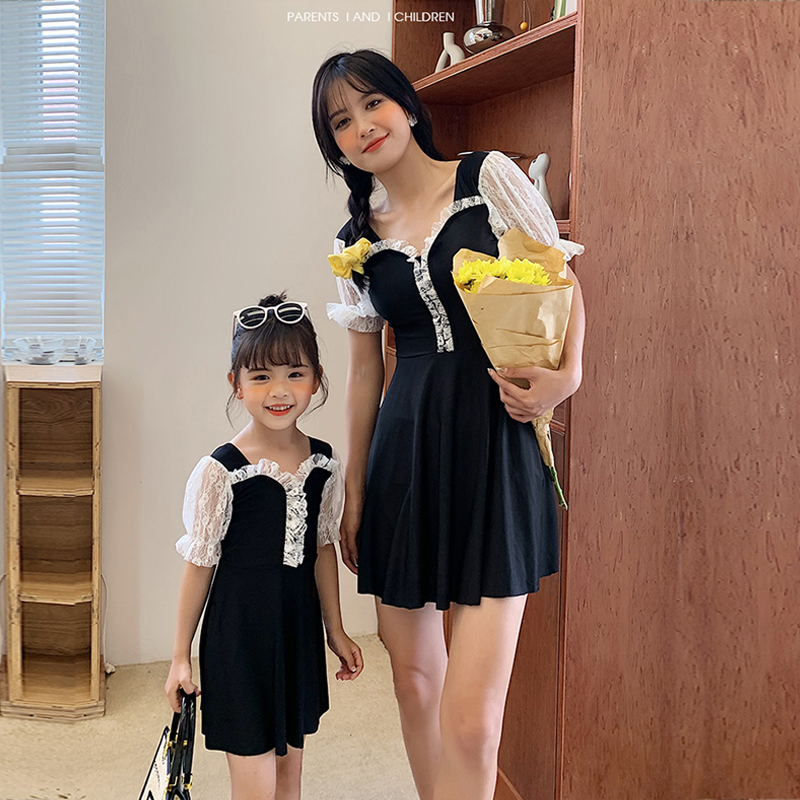 The new parent-child swimsuit mother woman's one-piece dress girl girl girl's slim fit swimsuit seaside family swimsuit
