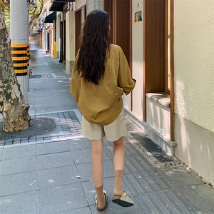 秋季长袖衬衫上衣女设计感小众新款宽松翻领黄色ins韩系纯色衬衣图片