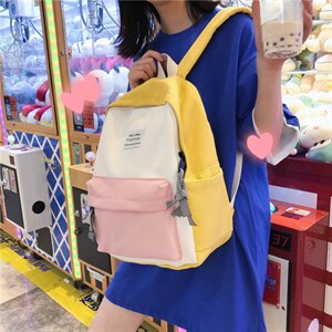 初高中书包2021时尚少女撞色帆布双肩包开学季女包图片