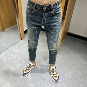春季高端牛仔裤男潮牌印花破洞补丁时尚设计痞帅修身小脚长裤百搭图片
