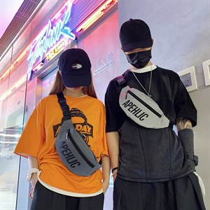 创意款单肩帆布包女嘻哈个性男士胸包腰包反光潮酷斜挎包图片