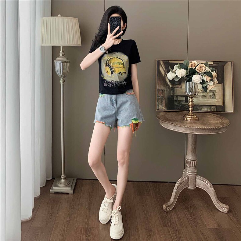 女夏季新款韩版运动休闲套装卡通印花圆领短袖宽松牛仔短裤两件套图片