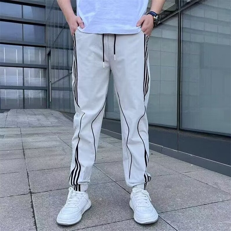 高品质新款春秋男款休闲裤男士束脚弹力条纹拼接潮流MKB24P47,男装休闲裤,星座1013-5