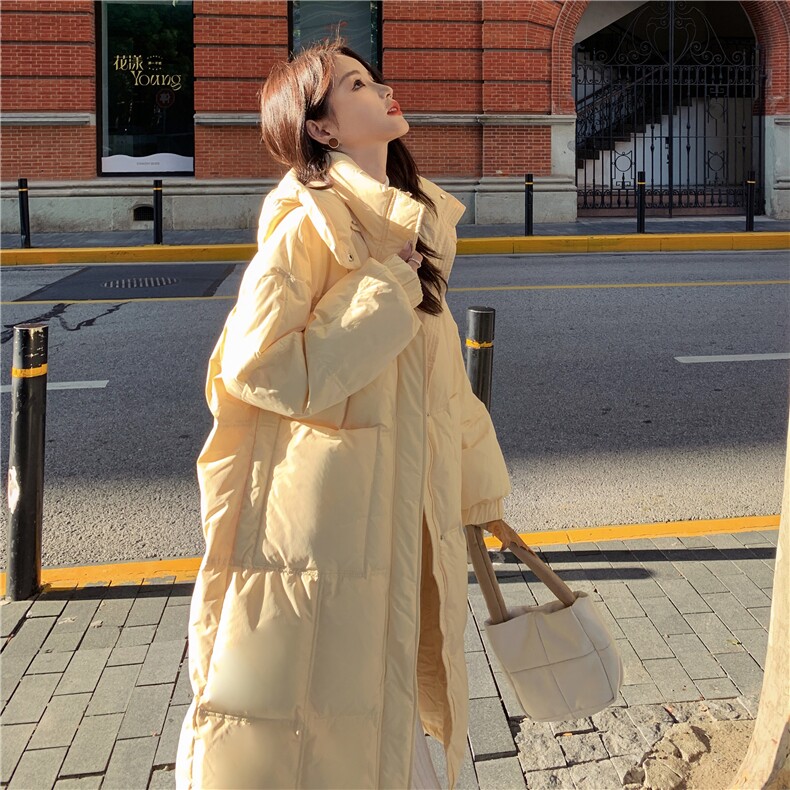 黄色连帽长款羽绒服女冬2025新款气质温柔风90白鸭绒面包服外套图片