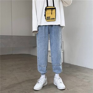 韩版贴布潮流松紧腰宽松哈伦束脚牛仔裤INS男休闲运动裤Q68图片