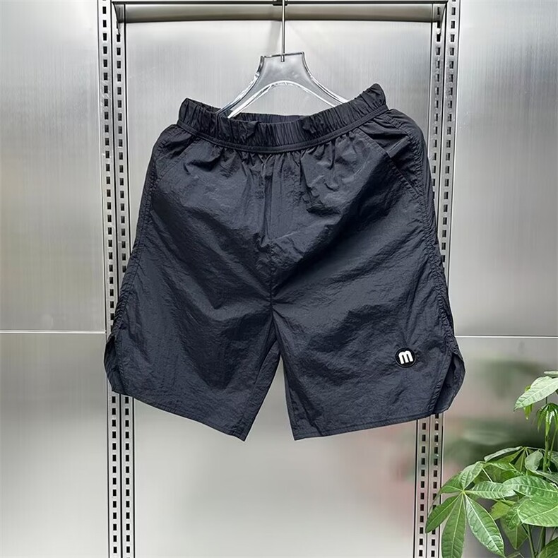 特大码300斤夏季薄款宽松直筒休闲短裤男女装速干运动五分沙滩裤图片
