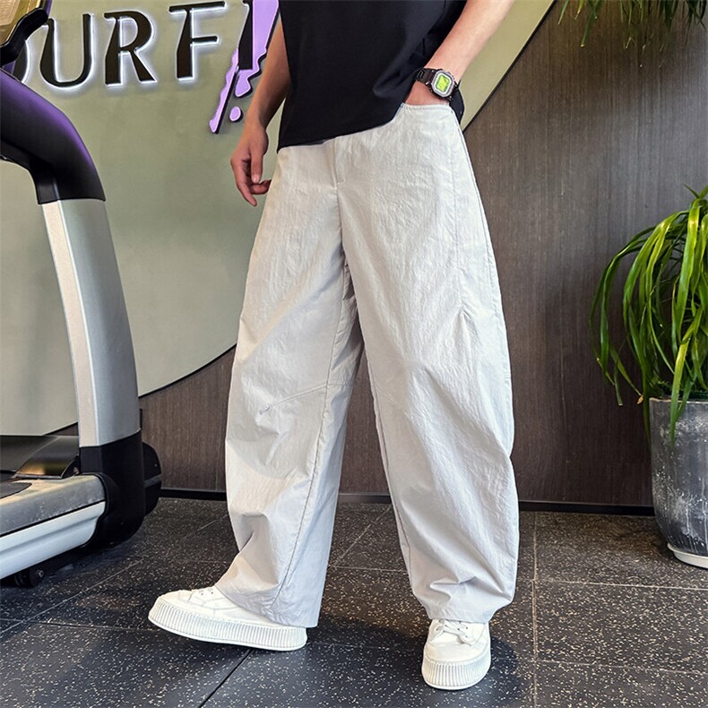 K20513-P68  春夏新款纯色宽松高级感弯刀休闲裤男高街阔腿速干裤图片
