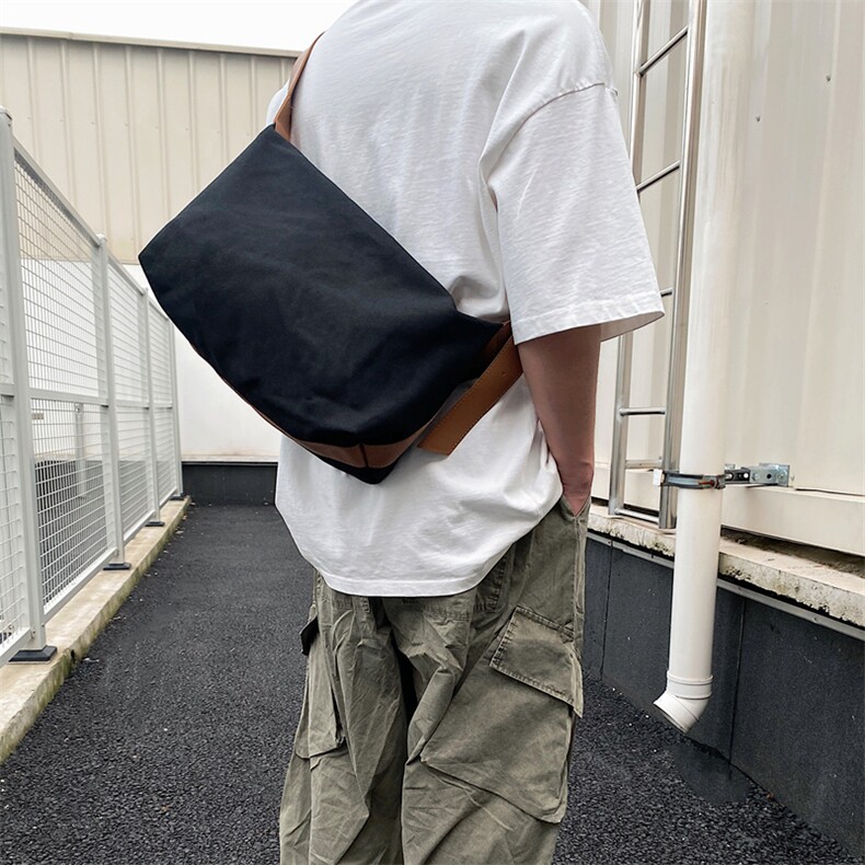 潮酷黑色大容量斜挎单肩帆布包潮男PU手提包FC84-P45图片