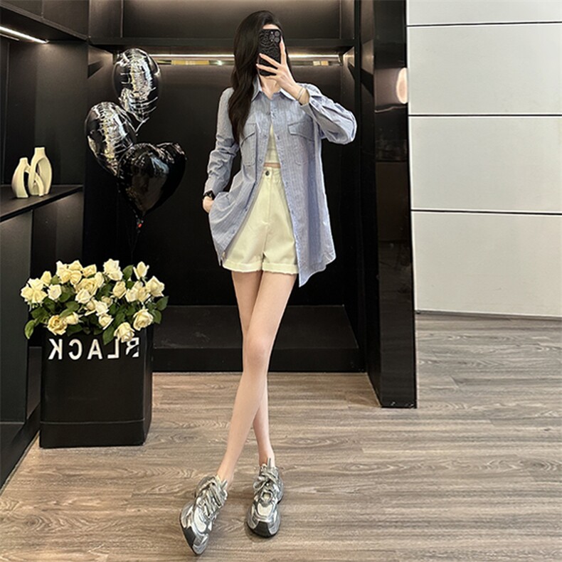 欧货时尚设计感女装春季新款单排扣翻领气质显瘦中长款纯色衬衣潮图片