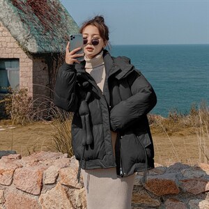 2021冬季新款韩版宽松中长款休闲连帽羽绒服女配挂件小兔子图片