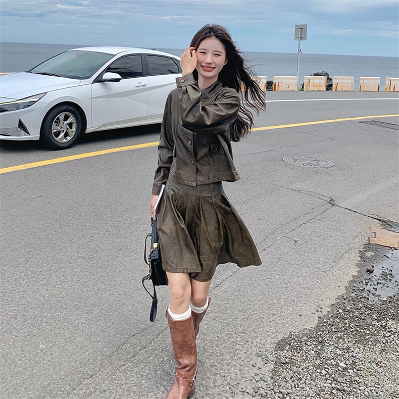 时尚皮套装套裙百皱短裙,女装皮衣,浙宝069