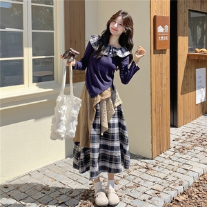 休闲减龄穿搭藏蓝色T恤套装女春秋超火好看高级感格子长裙两件套图片