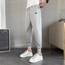 网红潮牌针织卫裤男韩版修身束脚裤纯色休闲运动裤社会小伙裤子图片