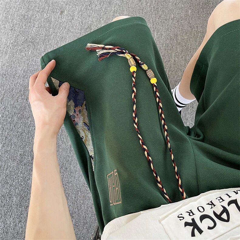 A316-1-K1229P35控48 夏季2025新款菠萝格风短裤小熊拼接五分裤图片