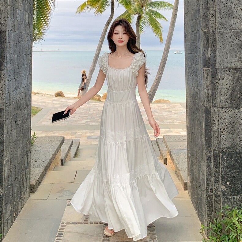 木耳边白色小飞袖连衣裙女夏季2025新款法式吊带裙超仙蛋糕长裙图片