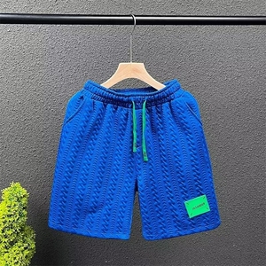 夏季简约贴标运动五分裤男潮牌宽松情侣休闲短裤夏天男装韩版中裤图片