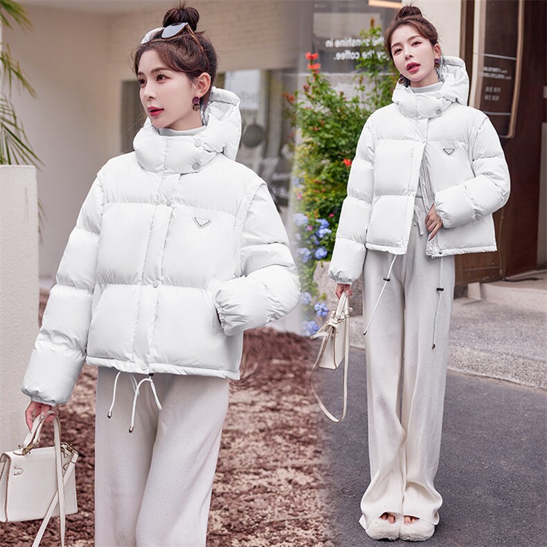 现货2023韩版可拆袖两穿连帽羽绒服三角标保暖网红白鸭绒厚女外套,女装羽绒服,仟媚宠
