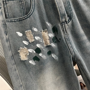 水洗破洞牛仔裤男春季设计感小众宽松阔腿直筒拖地裤美式ins裤子图片