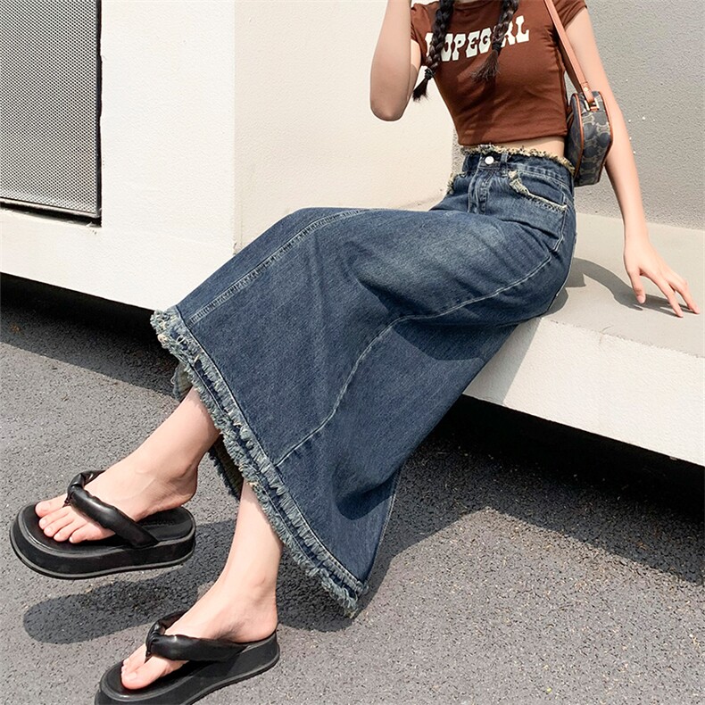 开叉牛仔半身裙女春夏新款高腰a字中长百搭宽松毛边包臀裙子，女装牛仔裙，梦白服饰厂