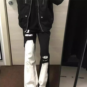 美式高街风裤子黑白拼接破洞牛仔裤男款修身百搭显瘦微喇长裤图片