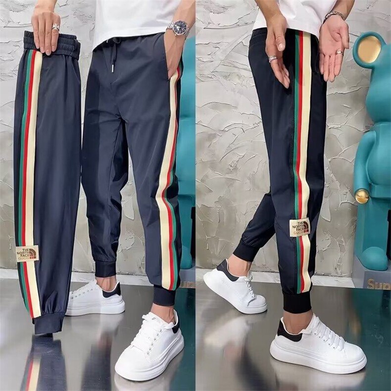 微弹拼色条纹休闲裤男士时尚潮牌夏季薄款速干束脚修身哈伦九分裤图片