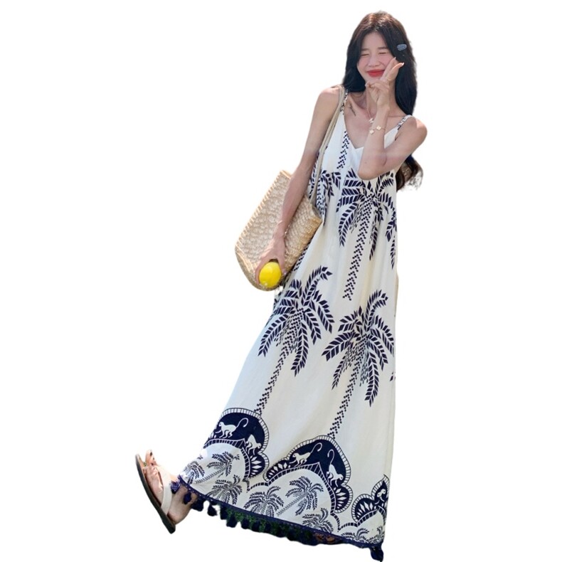 海边度假松弛感吊带连衣裙女2025年夏季新款印花流苏气质休闲长裙,女装连衣裙,诺蝶