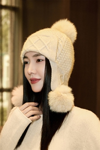 时尚保暖女羊绒毛线帽秋冬新款加厚护耳针织帽优雅百搭皮草球装饰图片