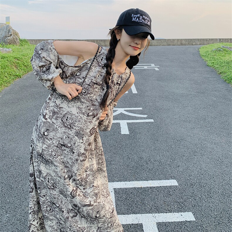 水墨印花露肩连衣裙女春季2025新款法式气质小心机茶歇度假风长裙图片
