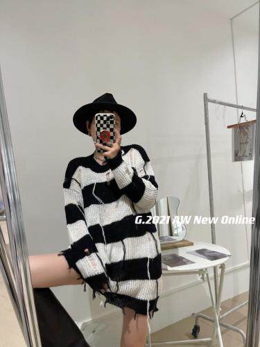 现货秋季新款破洞针织个性毛衣，女装针织衫/毛衣，G