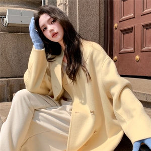 韩版气质宽松高级感外套女2025年秋冬季新款鹅黄色双排扣毛呢大衣图片