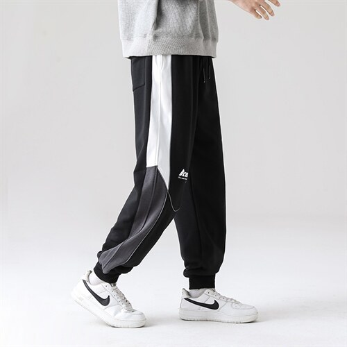 7XL-M休闲运动卫裤男2023春季新款拼色长裤休闲裤学生加肥加大码,男装休闲裤,钱塘717(原712)