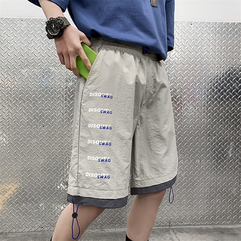 【】A003-HK7109-P40夏装新款时尚字母印花休闲短裤 女模图片