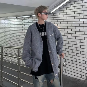 撞色毛衣男秋冬季设计感慵懒风针织外套保暖套头圆领线衣图片