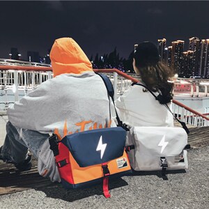 0753新款背包撞色闪电休闲情侣潮酷牛津布单肩斜挎包斜跨背包
