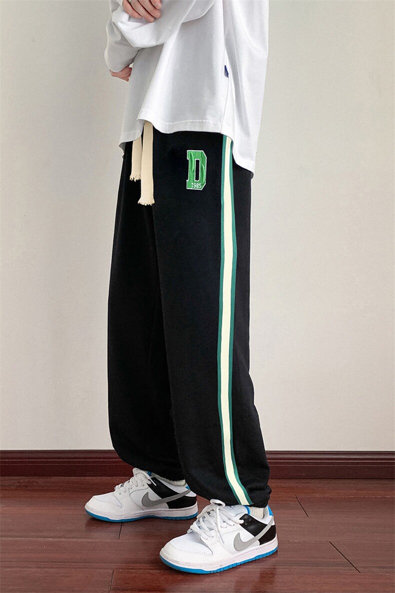 703-K871-P45春季休闲绣花织带拼接卫裤,男装休闲裤,星座703