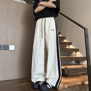 藏青色侧边条纹拼接休闲长裤男春季潮牌宽松直筒阔腿裤速干运动裤图片