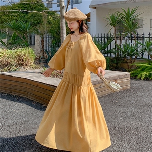 黄色法式度假风灯笼袖连衣裙女2026春新款超好看宽松减龄过膝长裙图片