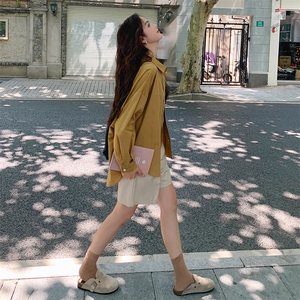 秋季长袖衬衫上衣女设计感小众新款宽松翻领黄色ins韩系纯色衬衣图片