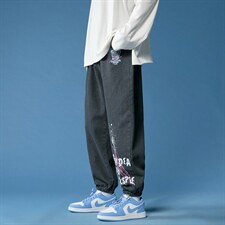 2023春季喷漆涂鸦印花牛仔束脚裤货号K579P55，男装牛仔裤，电商A063