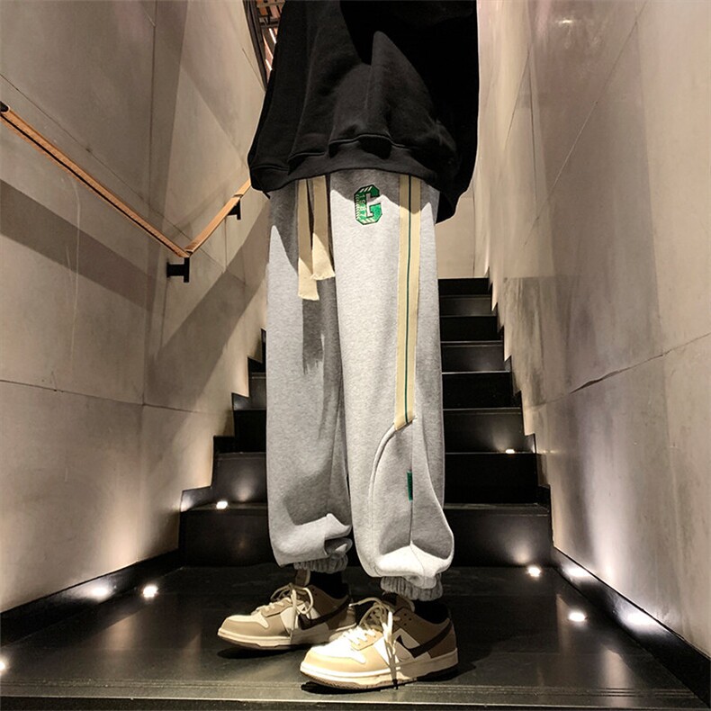 703-K879-P55加绒P65新款男绣花棉质束脚织带拼接卫裤,男装休闲裤,星座703